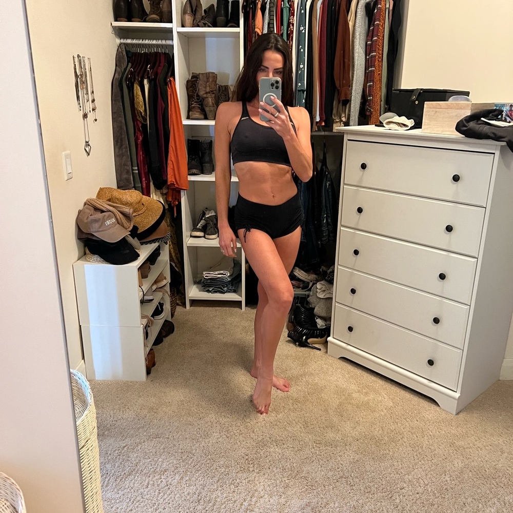 Lululemon Black hot short with side ties. Size 4